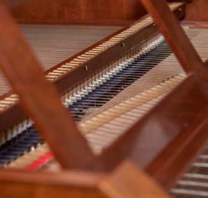 Close-up view of the inside of a historic keyboard instrument